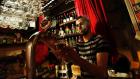 A bartender serves a beer in Istanbul. (Reuters)