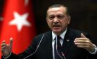 Turkey's Prime Minister Tayyip Erdogan addresses members of parliament in Ankara on February 26, 2013. (AFP)