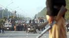 Supporters of Muhammad Tahir ul Qadri, who addressed protesters outside parliament on Tuesday, repeated calls for the ouster of the government. (Photo: W. Khan/European Pressphoto Agency)