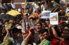 Iraqi Sunni protesters gather in Samarra on March 22, 2013 decrying the alleged targeting of their minority community by the Shiite-led authorities ahead of the provincial elections on April 20, 2013.
