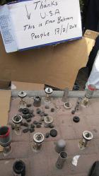 Following the crackdown on protests in Manama, protesters displayed tear gas canisters and pellets they said were made in the US. (Photo: Al Jazeera English)